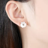 Petaline shell studs