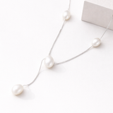 Seafoam pearl necklace with 3mm tassel