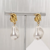 Golden pearl earrings