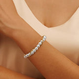 Treble gold bracelet