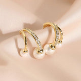 Duetto pearl earrings