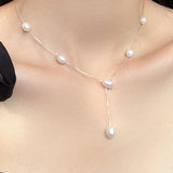 Seafoam pearl necklace with 3mm tassel